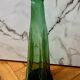 Vintage Viresa bottle in a flattened shape.