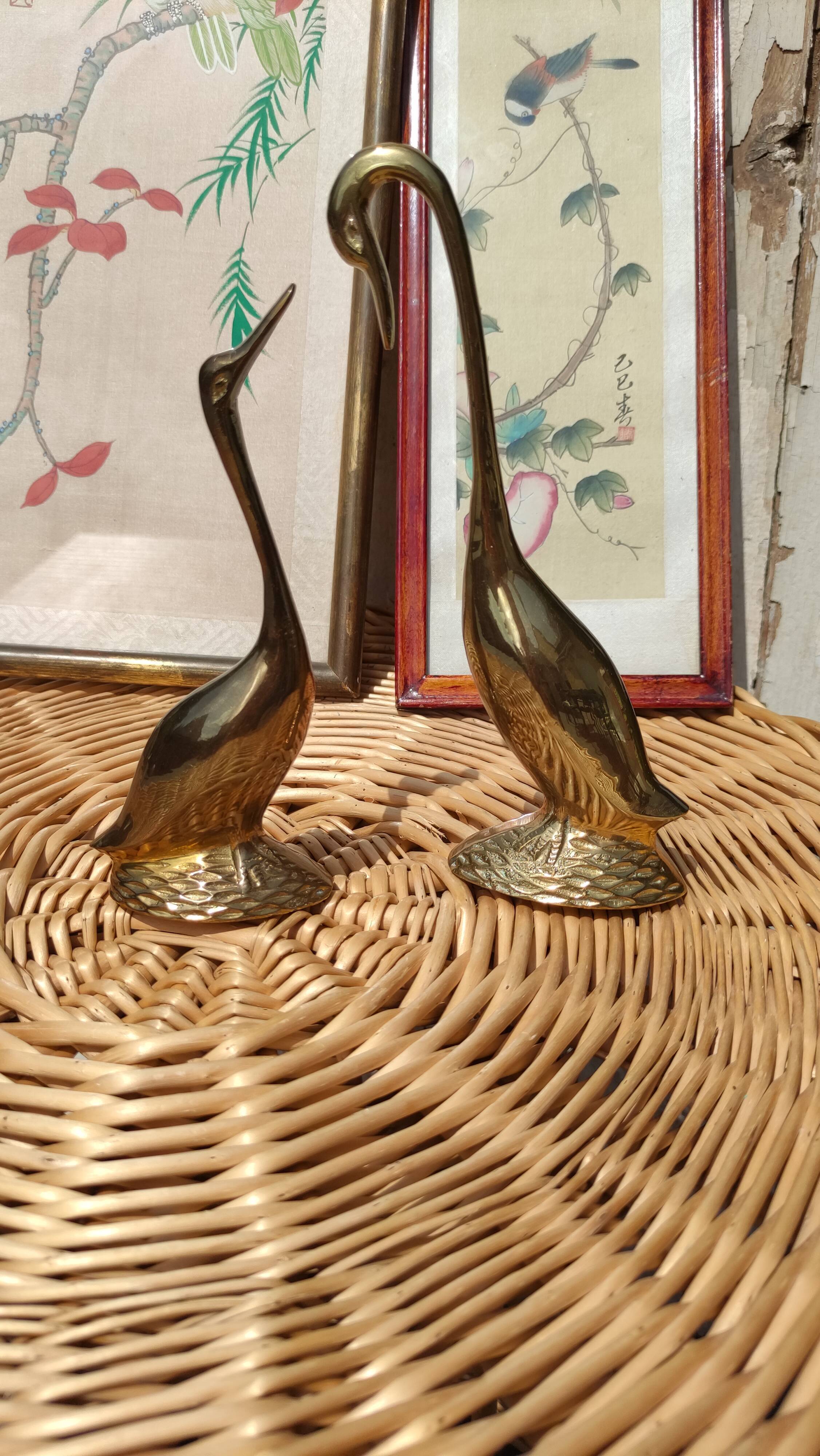 Duo of golden brass swans