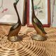 Duo of golden brass swans