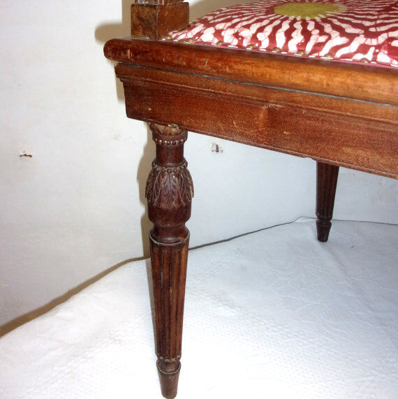 A Chair from the beginning of the 20th century in natural wood.