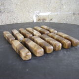 Twelve knife holders in onyx stone