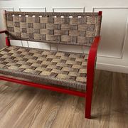 Vintage bench in red wood and rope
