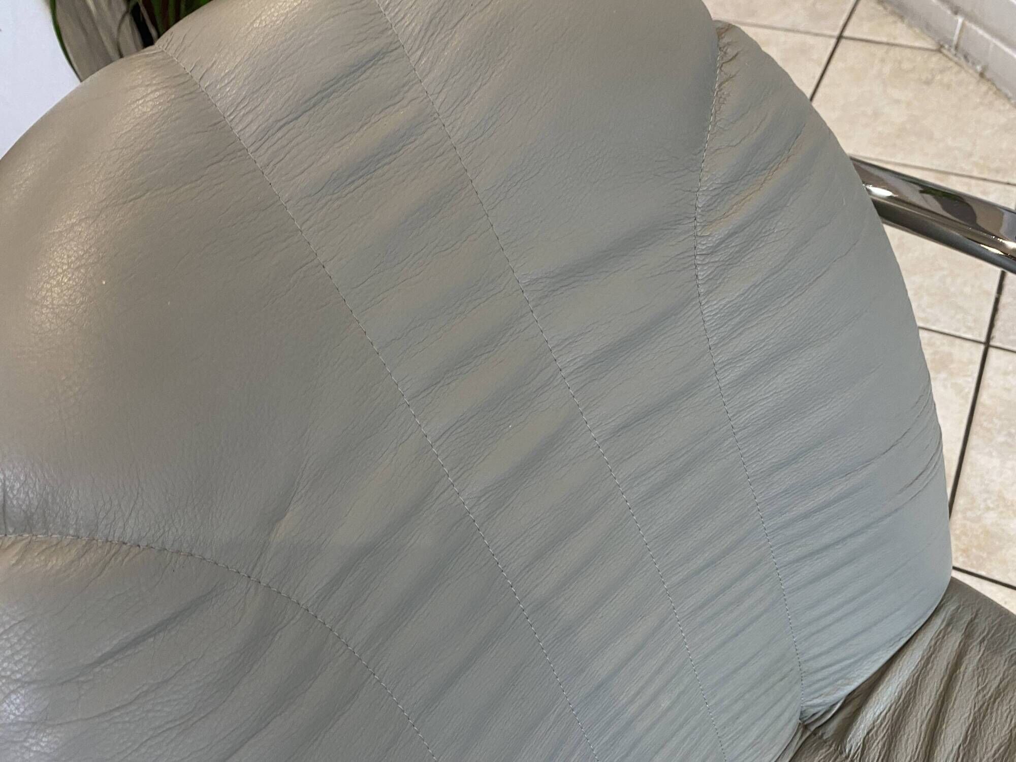 Pair of Souvignet armchairs, grey leather, chrome, 1980.