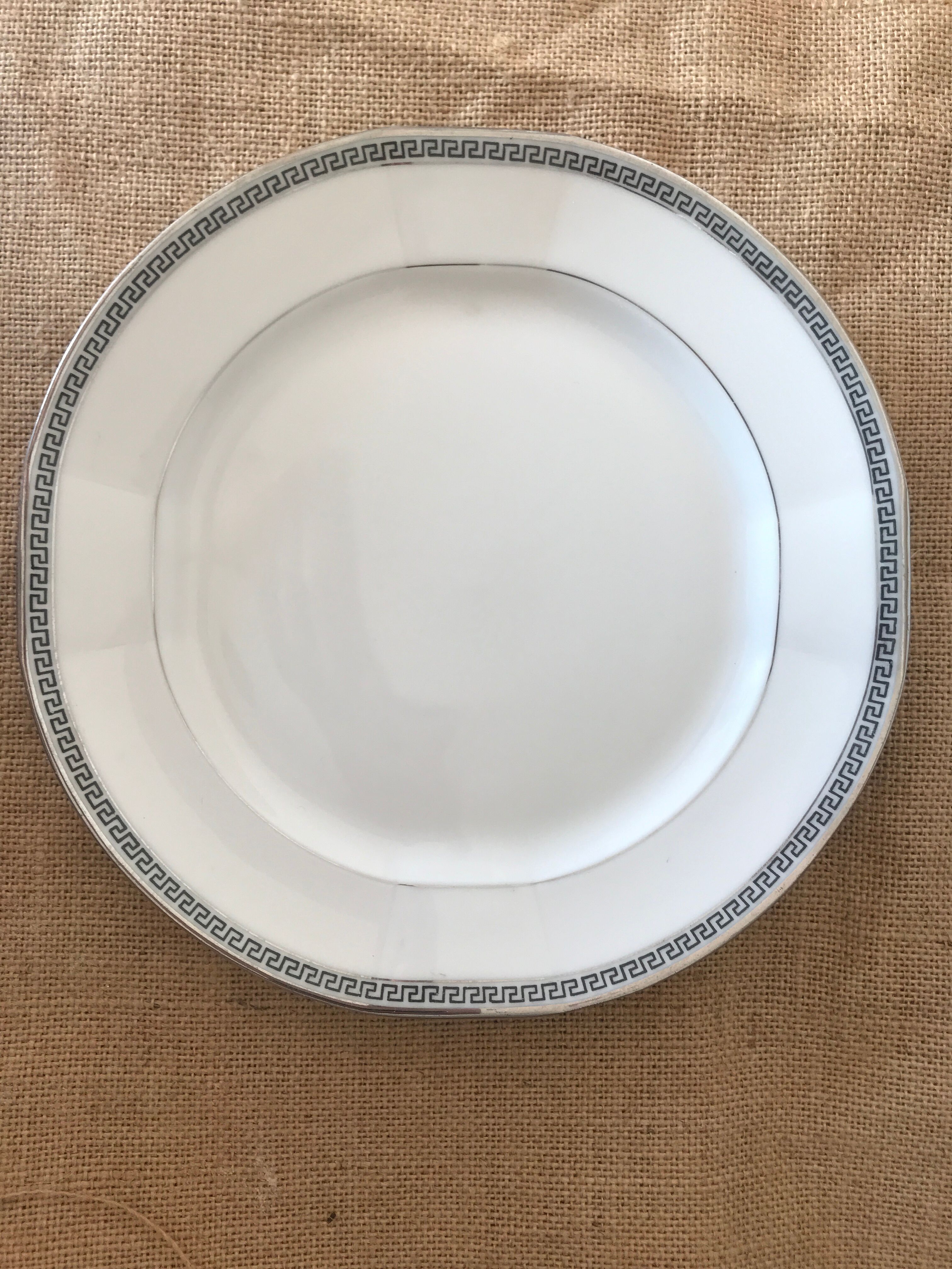 8 flat plates porcelain Art Deco Marc Larcheveque
