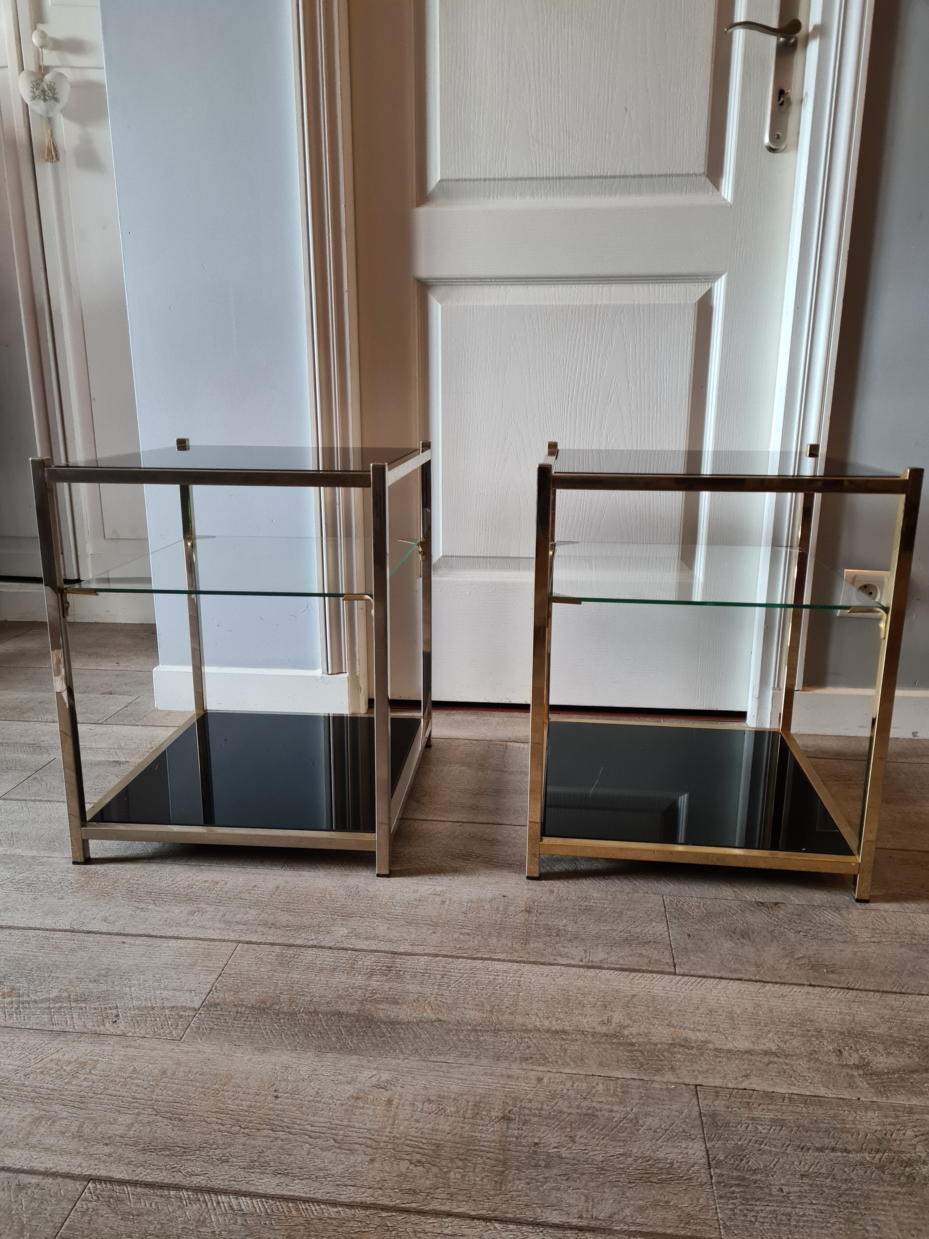 Pair of glass and brass sofa endsl