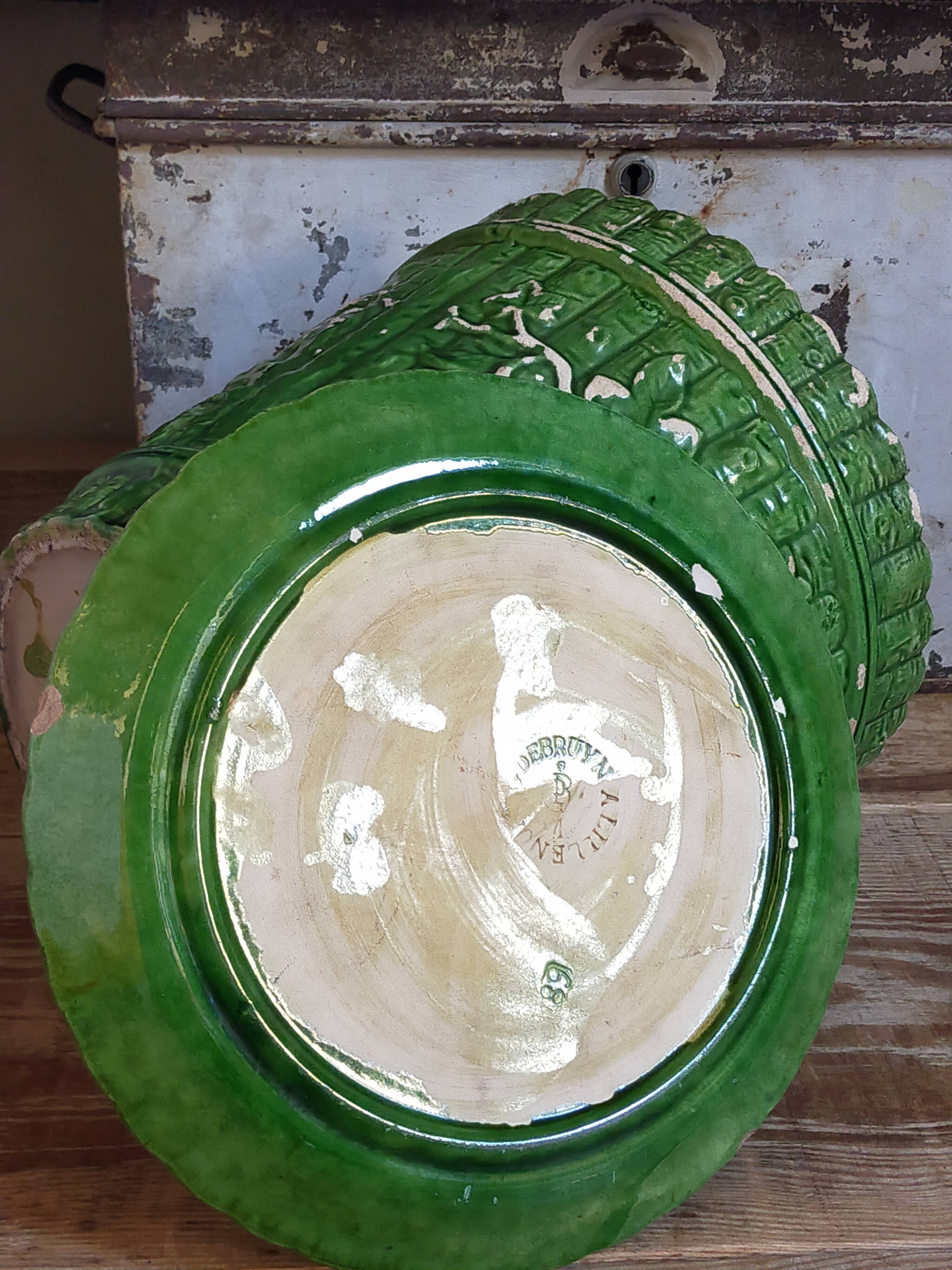 Flower pot and saucer in slip by G. De Bruyn 19th century