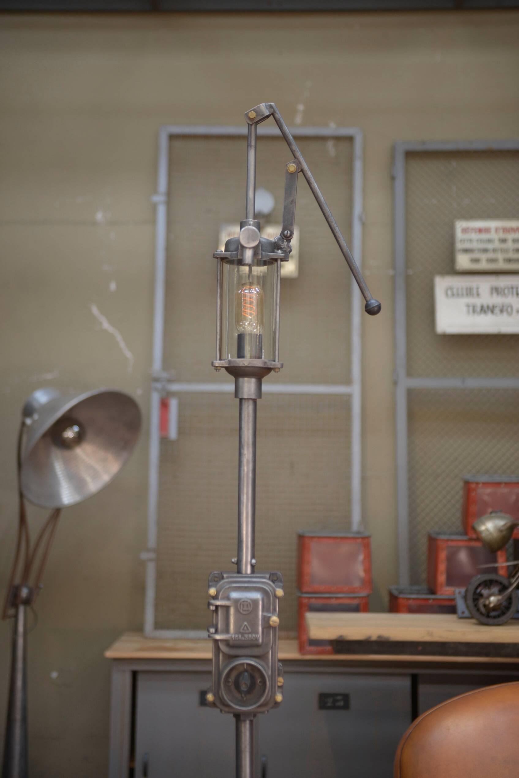 Old gas pump floor lamp in cast iron metal and glass 1930