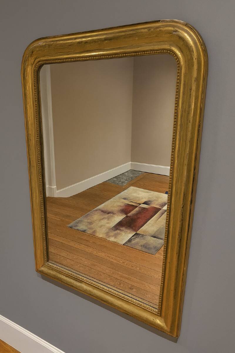 Louis Philippe period mirror in gilded wood