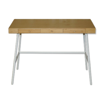 Small bamboo desk with three drawers.
