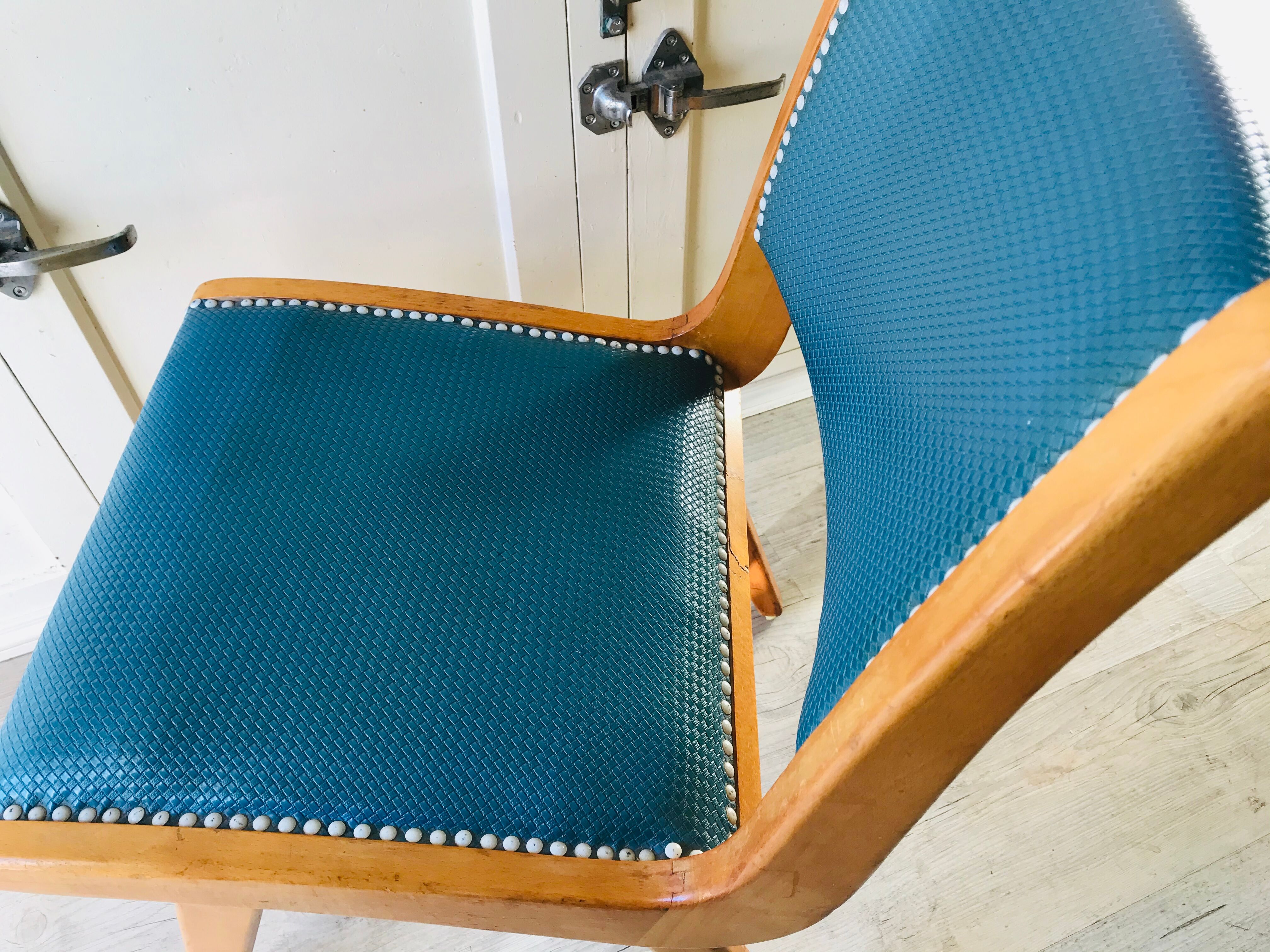 Vintage compass foot chair and studded blue skai