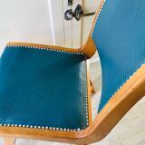 Vintage compass foot chair and studded blue skai