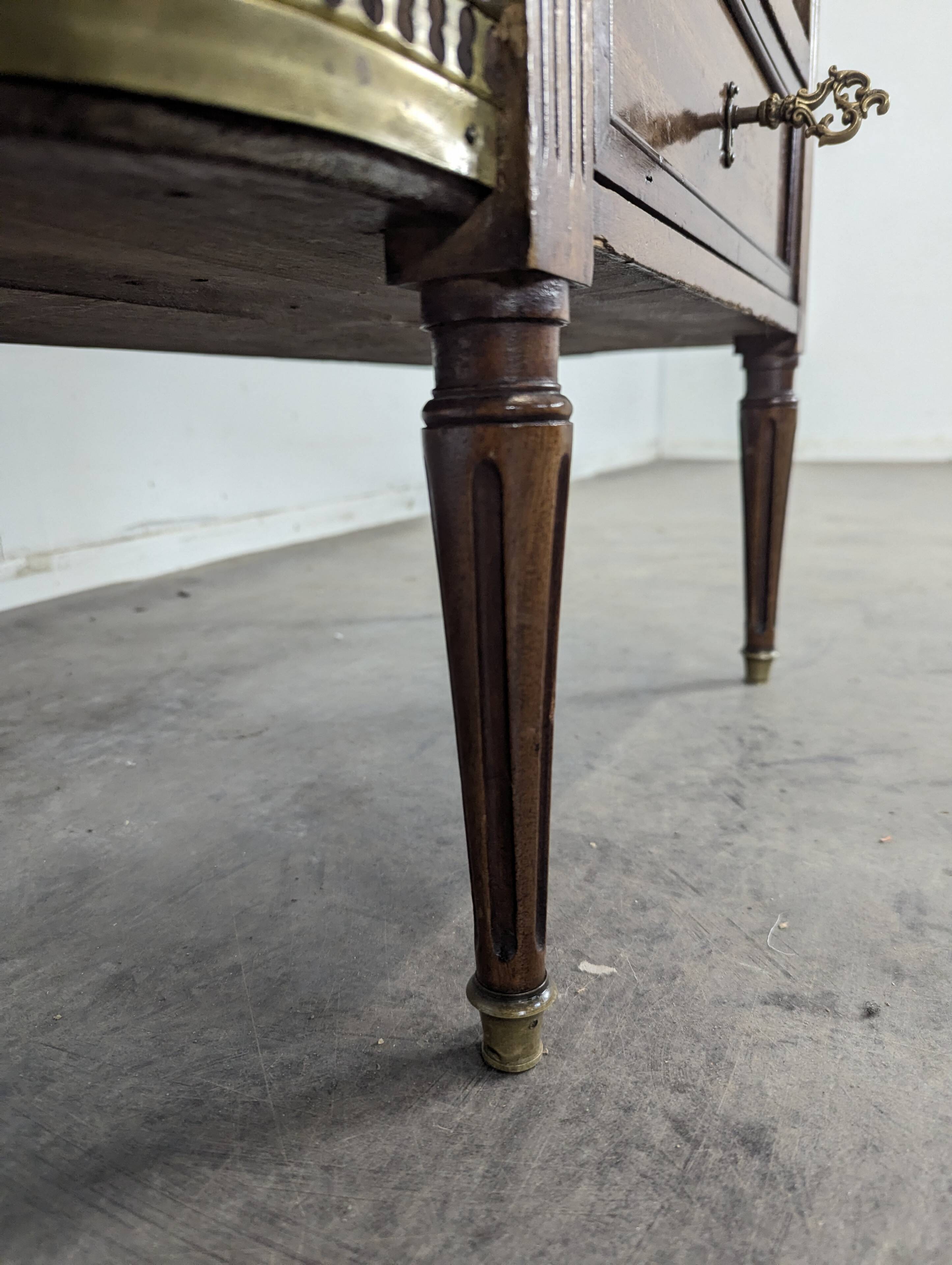 19th-century bar in Louis XVI style made of mahogany.