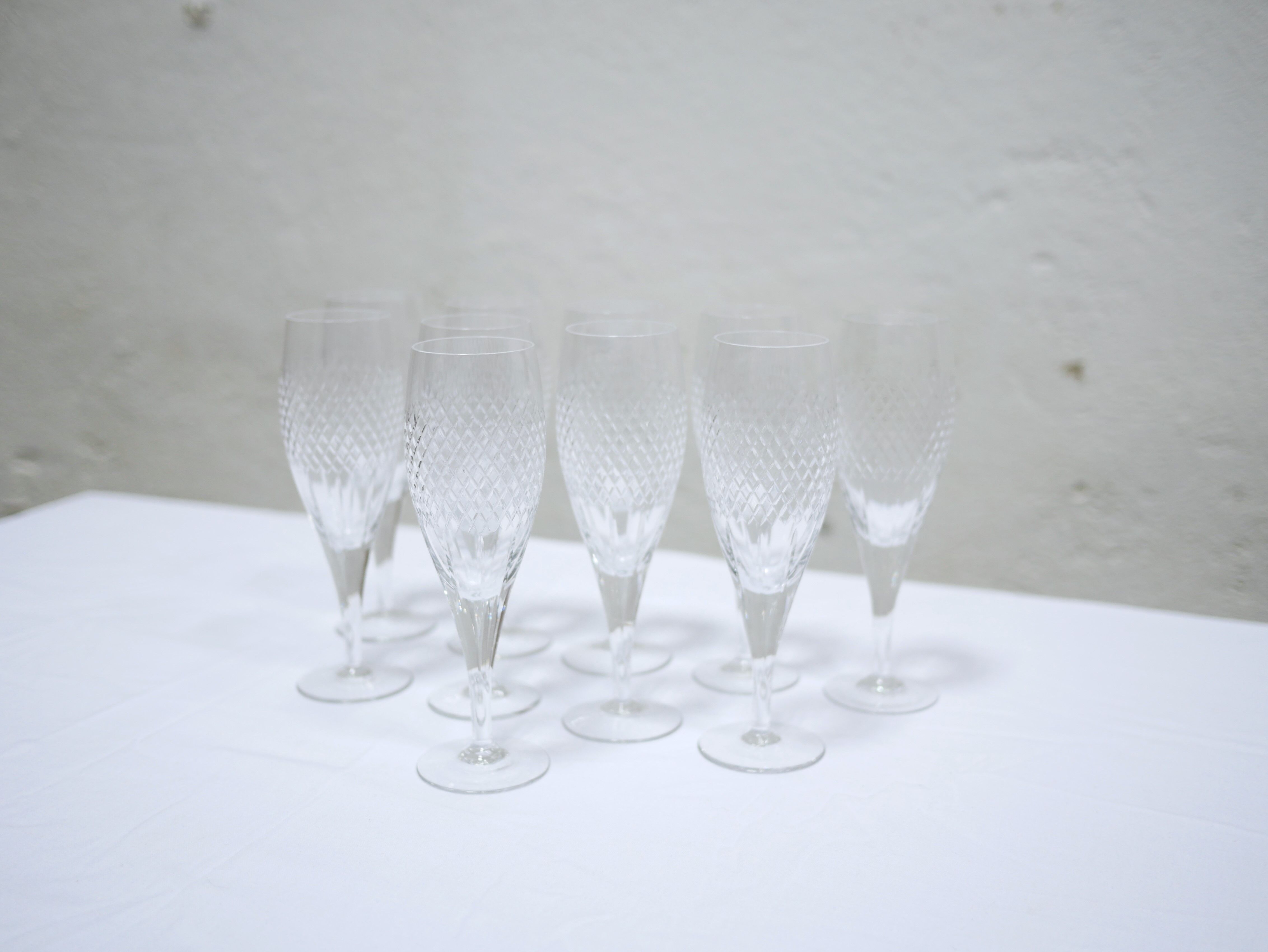 Series of 10 vintage crystal champagne flutes