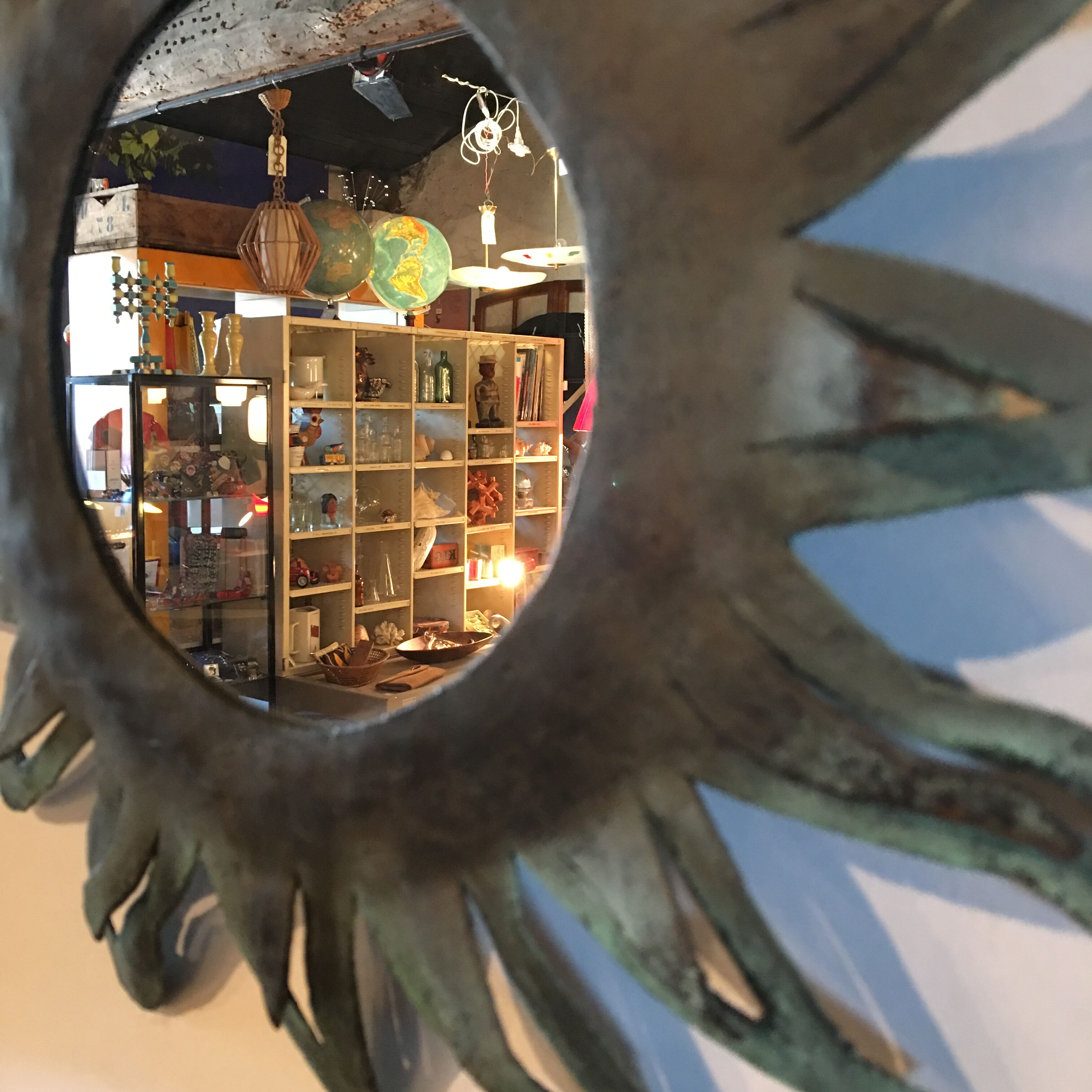 Sun patinated metal mirror 35cm