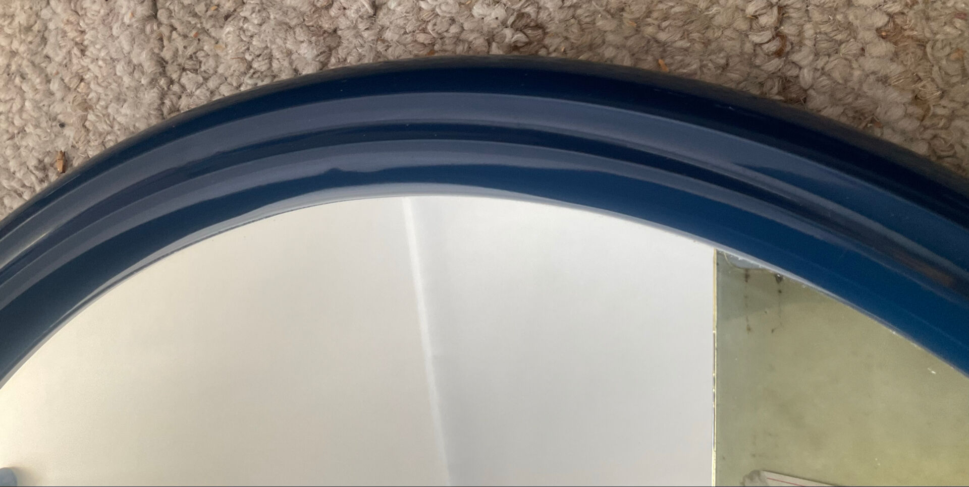 Round Tiger mirror from the 1970s.