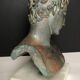 Greek bust in terracotta with bronze patina