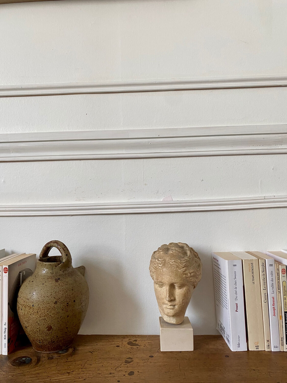 Head of a greek goddess in stone