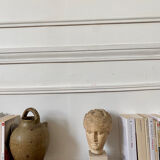 Head of a greek goddess in stone