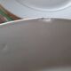 Mismatched old soup plates accompanied by a soup tureen