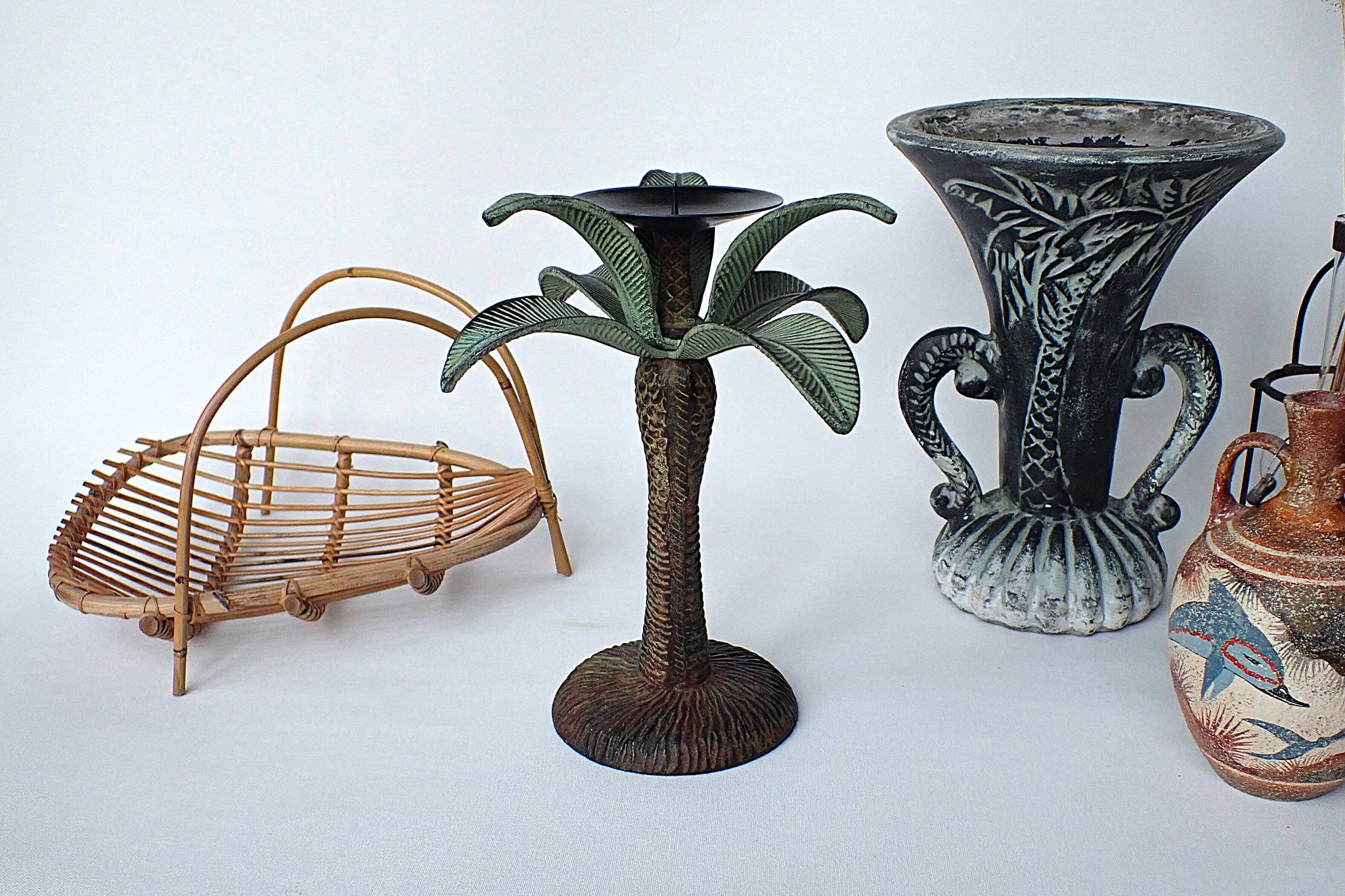 Antique palm tree-shaped candlestick in patinated metal