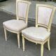 2 chaises Louis XVI en bois beige rembourrées