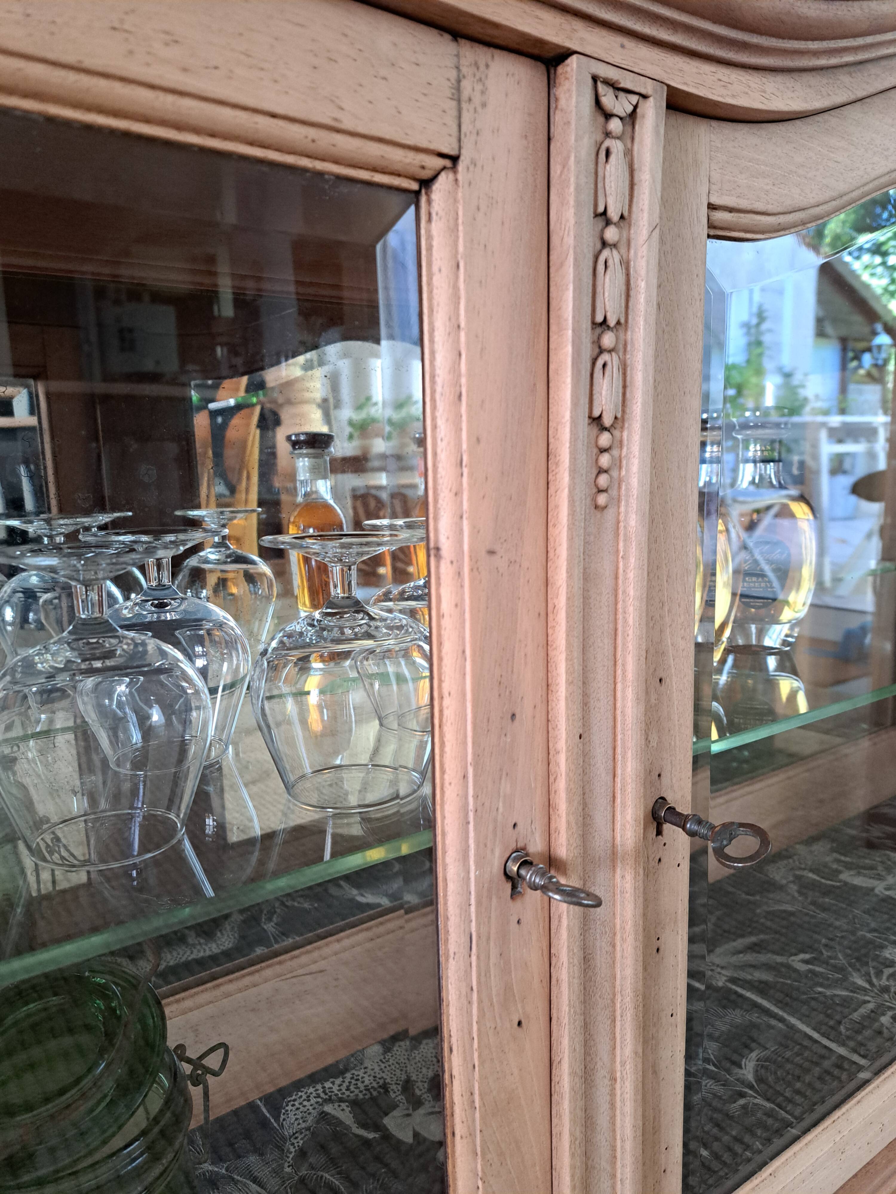 Vintage display cabinet in light wood
