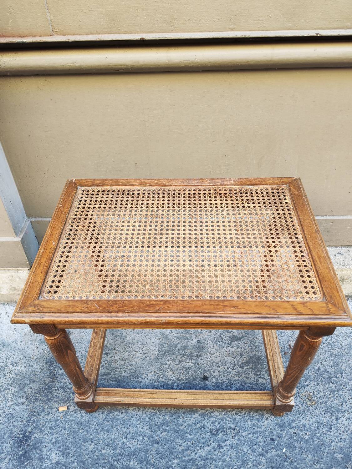 Wooden bench with caning