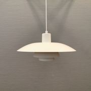Older ph 4/3 hanging lamp, in white, with original orange suspension disk.