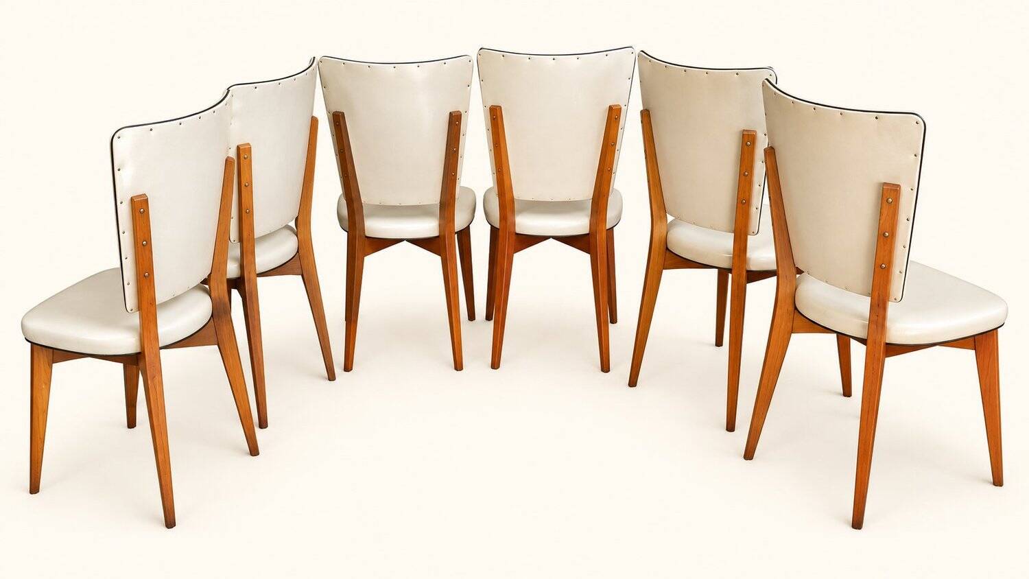 Set of 6 vintage chairs from the 1950s in wood and ivory white faux leather.
