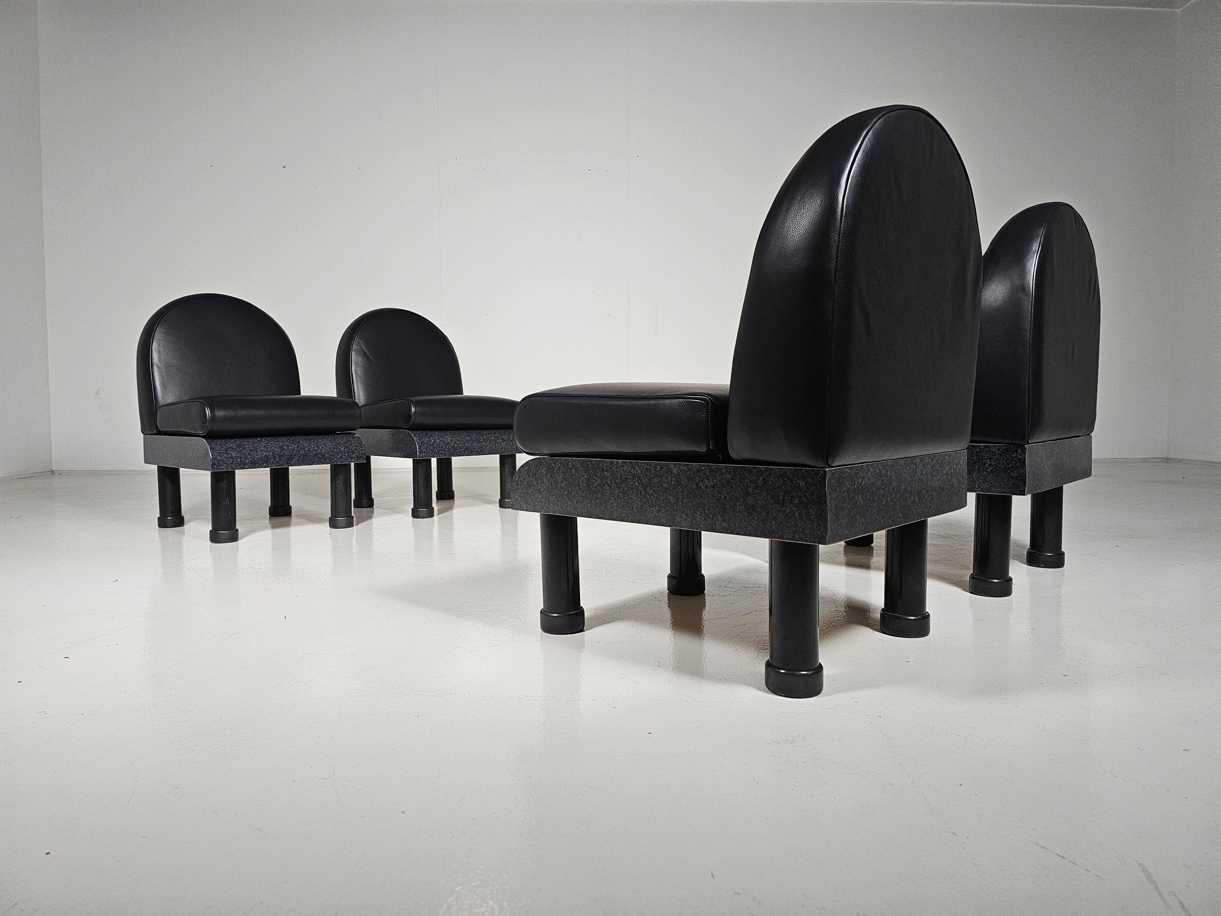 Black leather loungers , 1980.