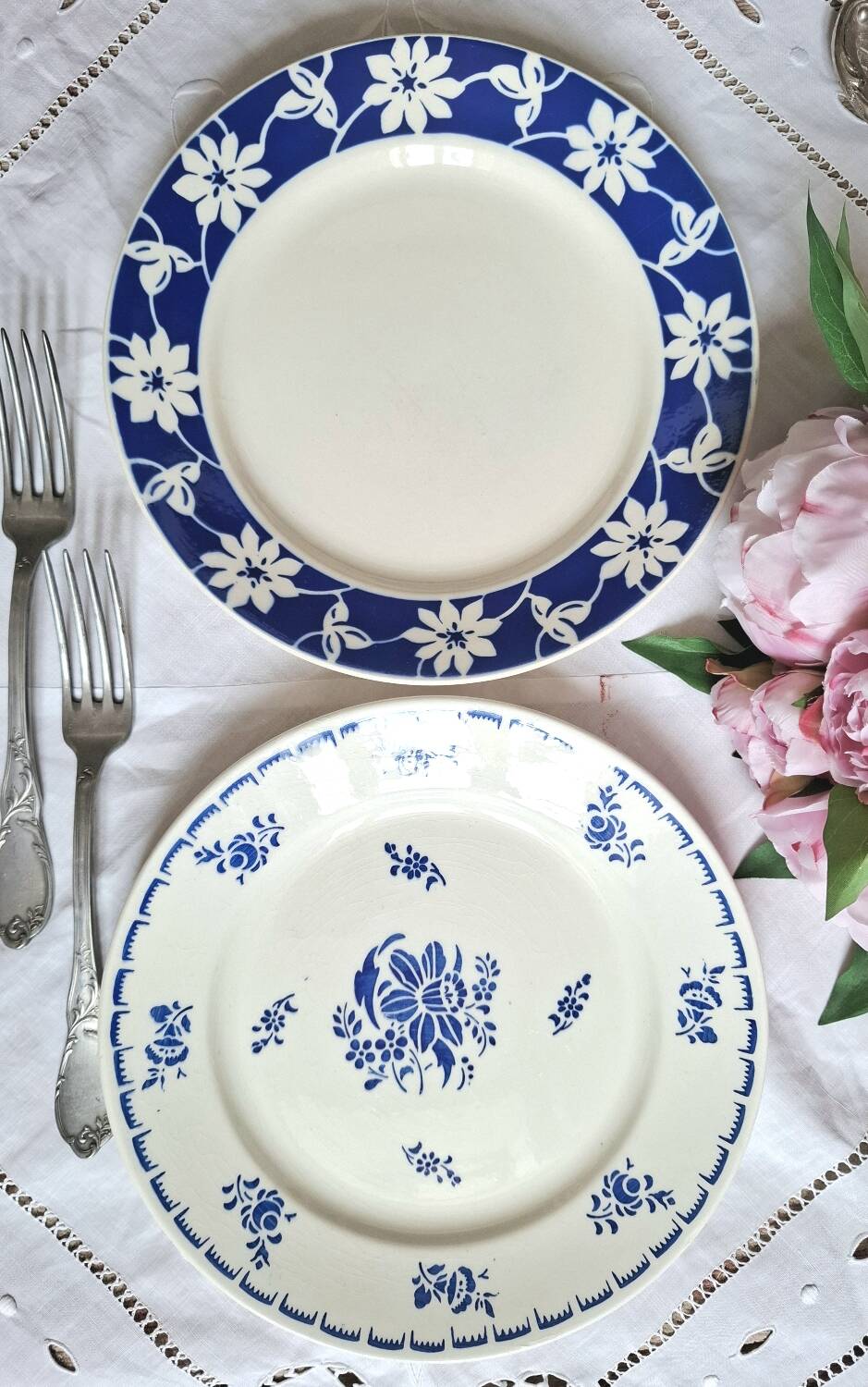 Mismatched antique flat plates accompanied by dishes.