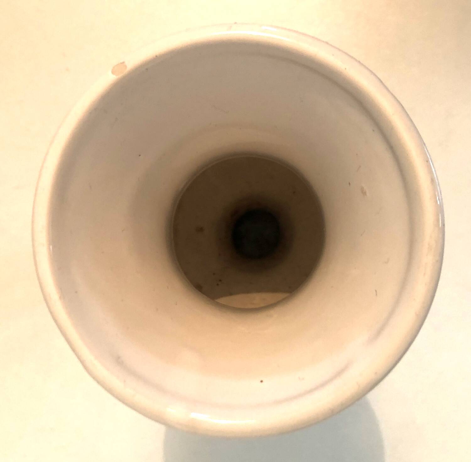 White ceramic medical vase