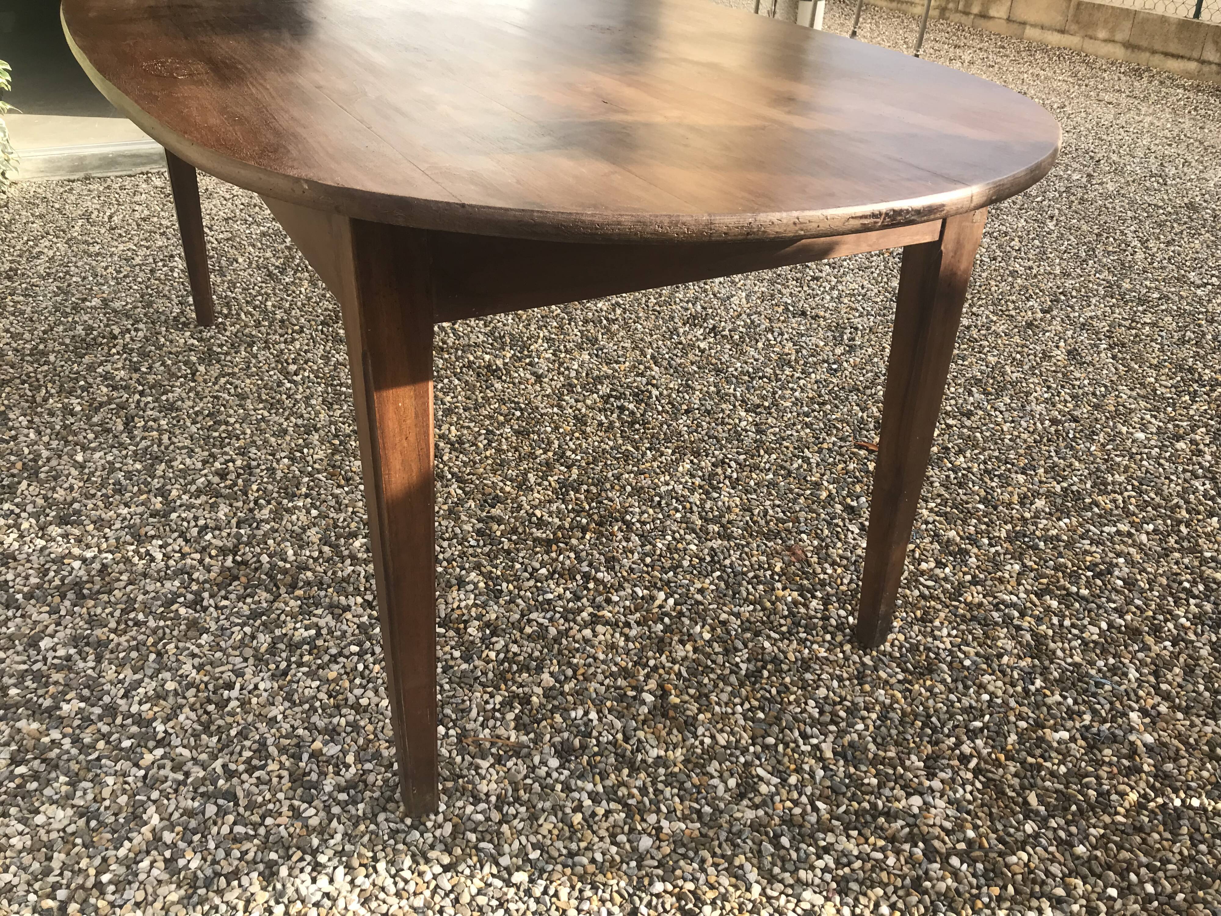 Oval farm table in massive walnut