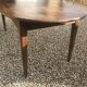 Oval farm table in massive walnut