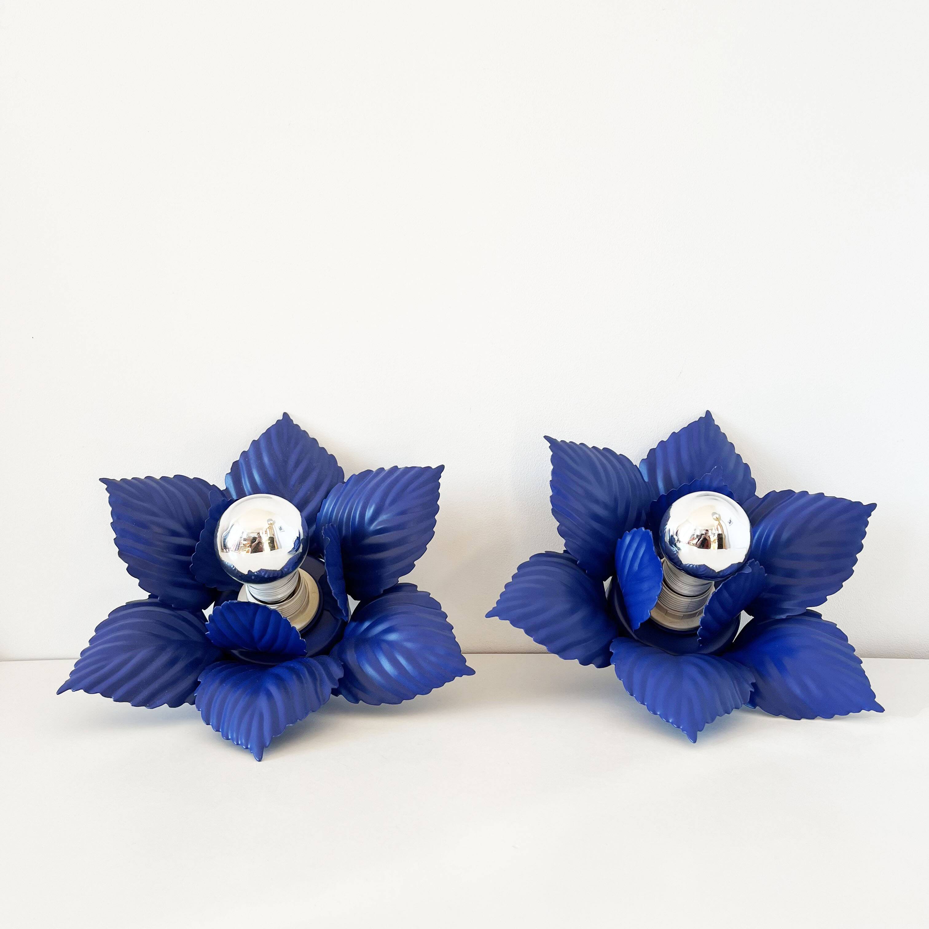 Pair of vintage Masca blue metal flower wall lights