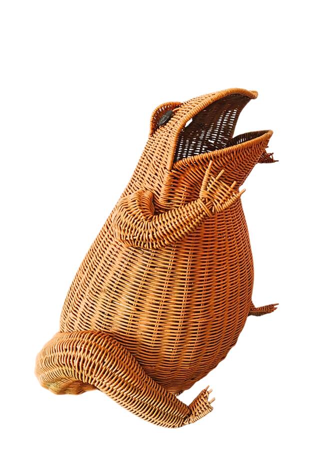 Vintage frog magazine rack in woven wicker design by Olivier Cajan