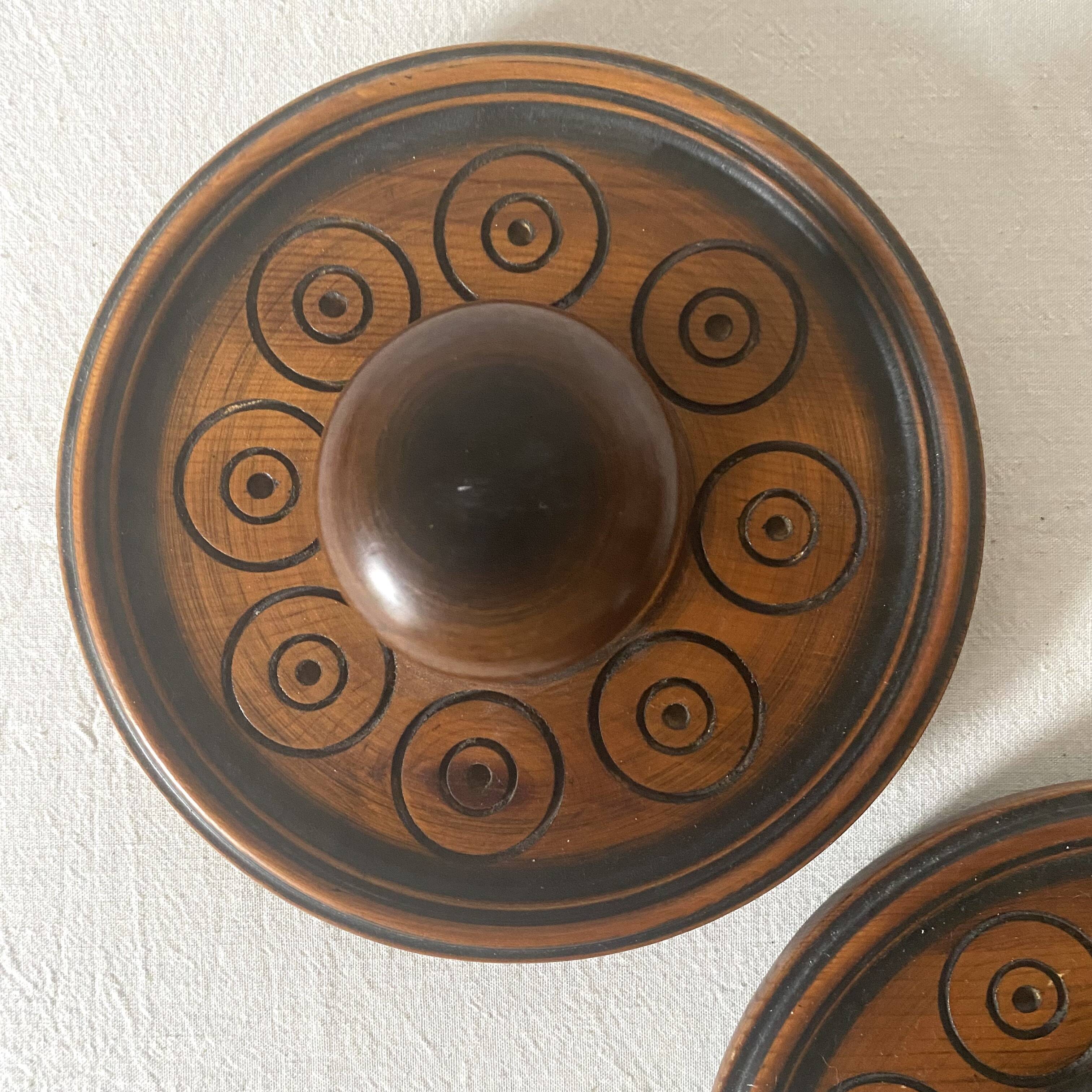 Pair of carved wooden wall hooks