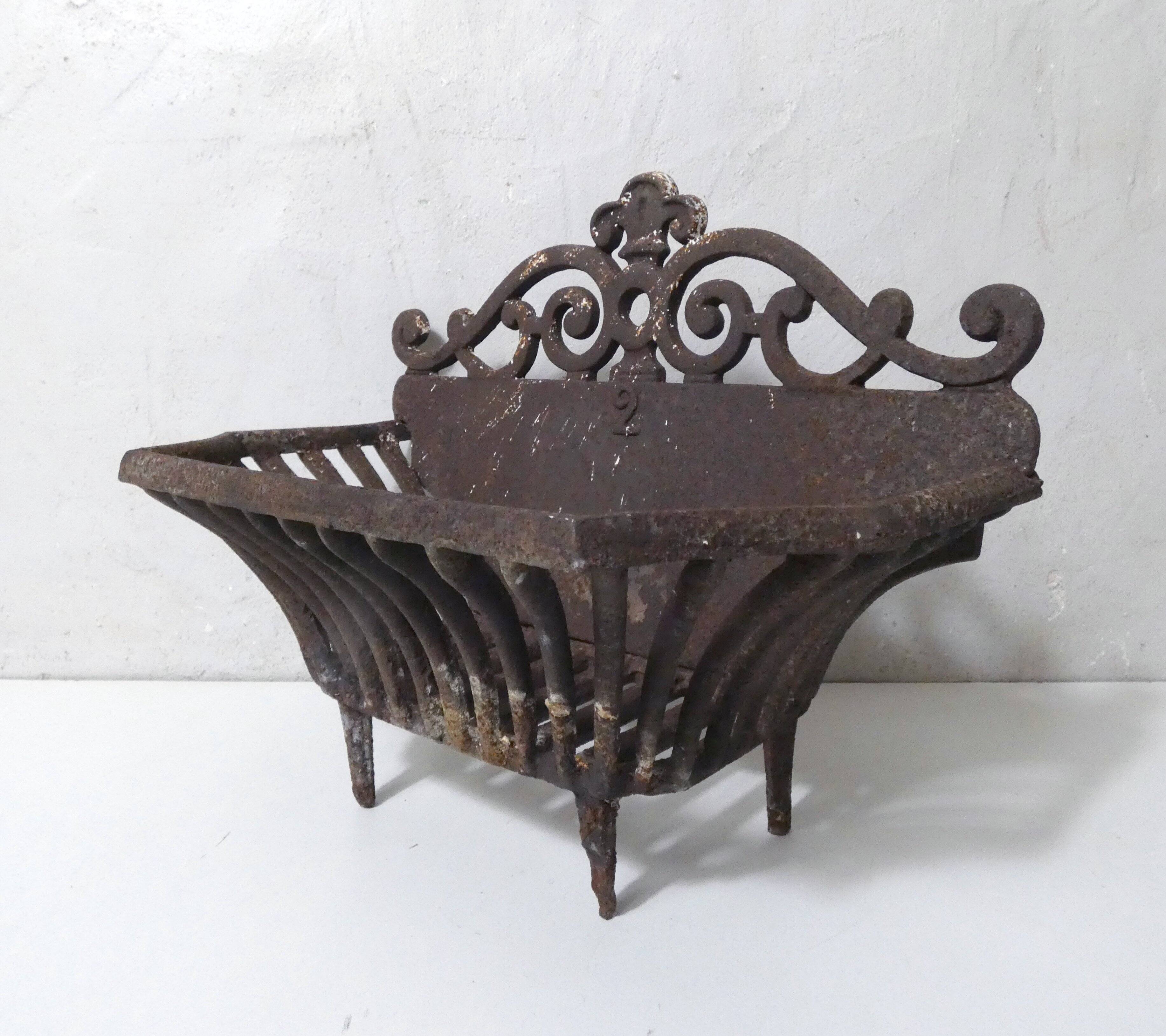 vintage cast iron log holder