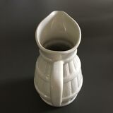 White barrel pitcher