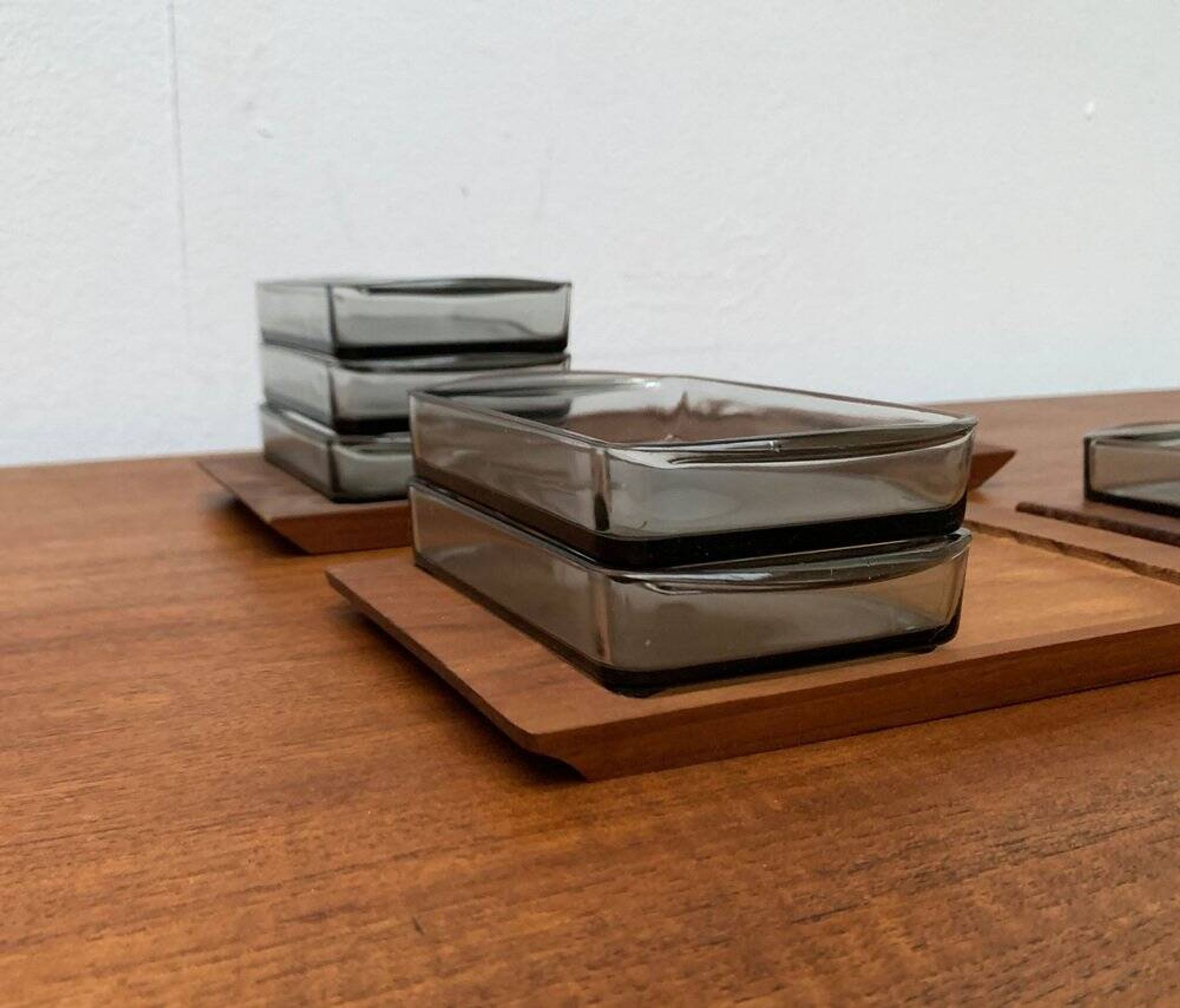 Danish mid-century teak plateau with Holmegaard glass serving trays, 1960s, set of 9.