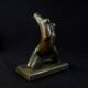 Modern sculpture of a nude woman in green ceramic, signed Carlos Nazareth