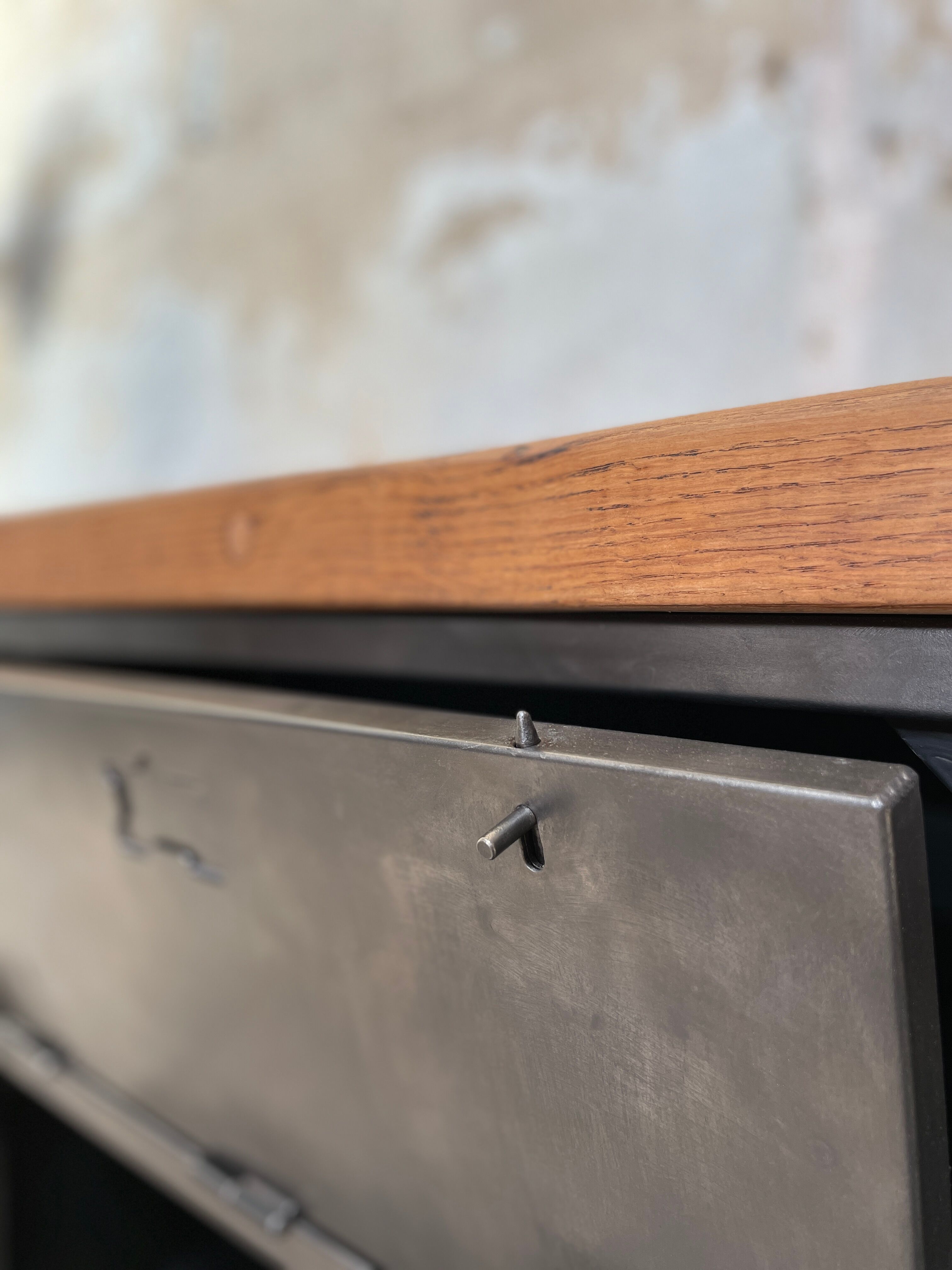 Industrial row in metal and oak.