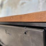 Industrial row in metal and oak.