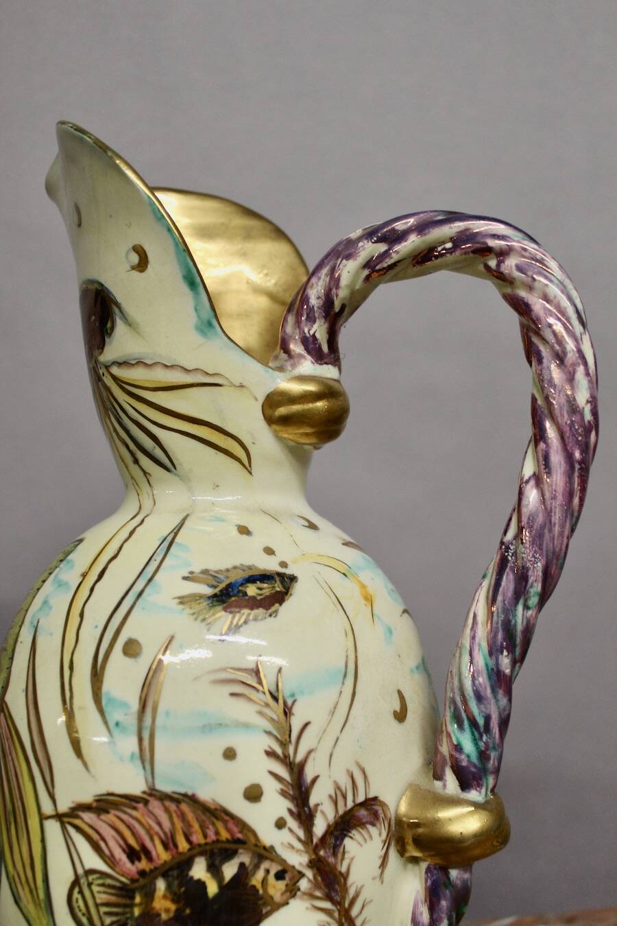 Ceramic jug with fish decoration