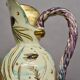 Ceramic jug with fish decoration