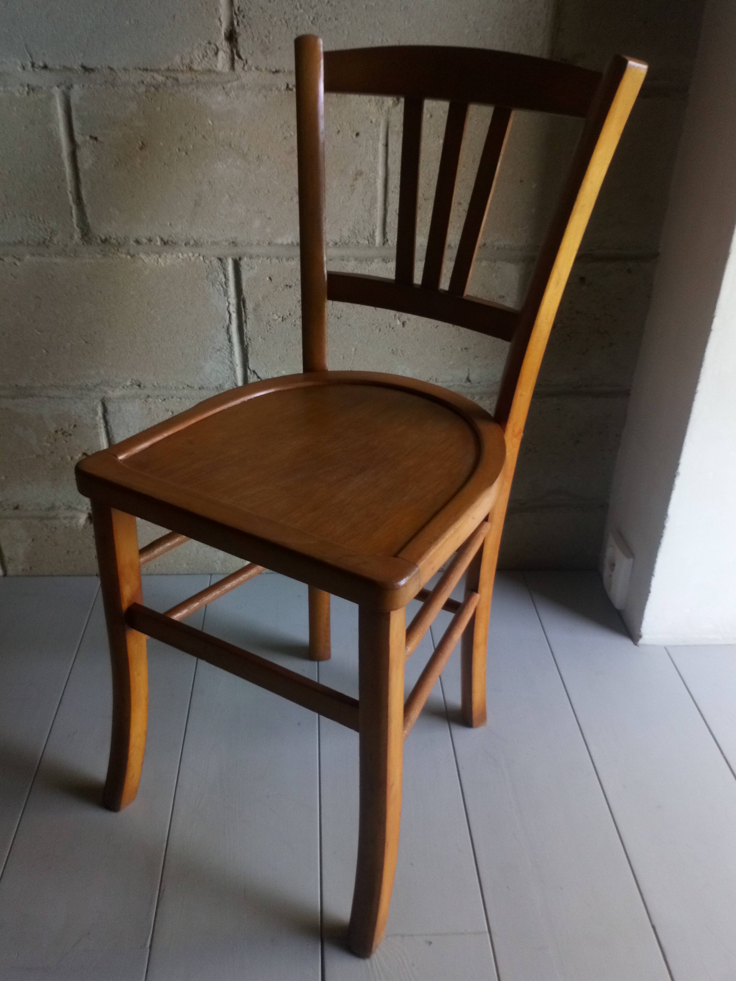 Blond wooden bistot chair from the 50s.