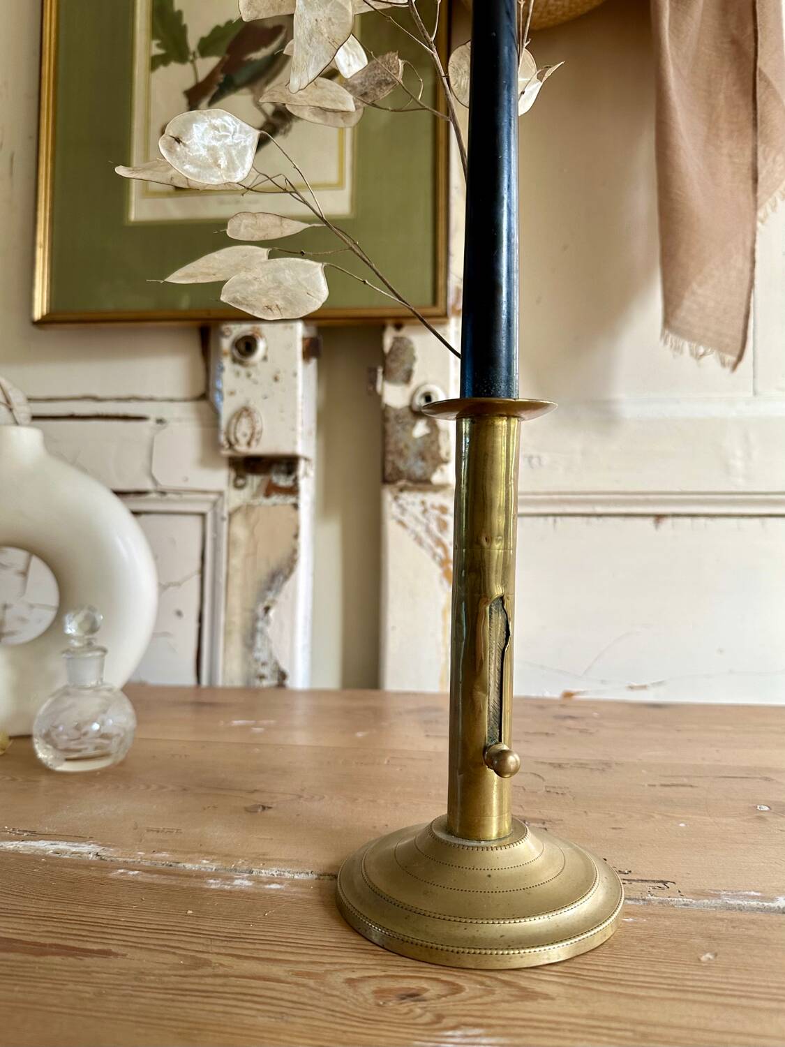 Old brass pull candle holder