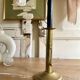 Old brass pull candle holder