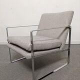 Pair of designer armchairs