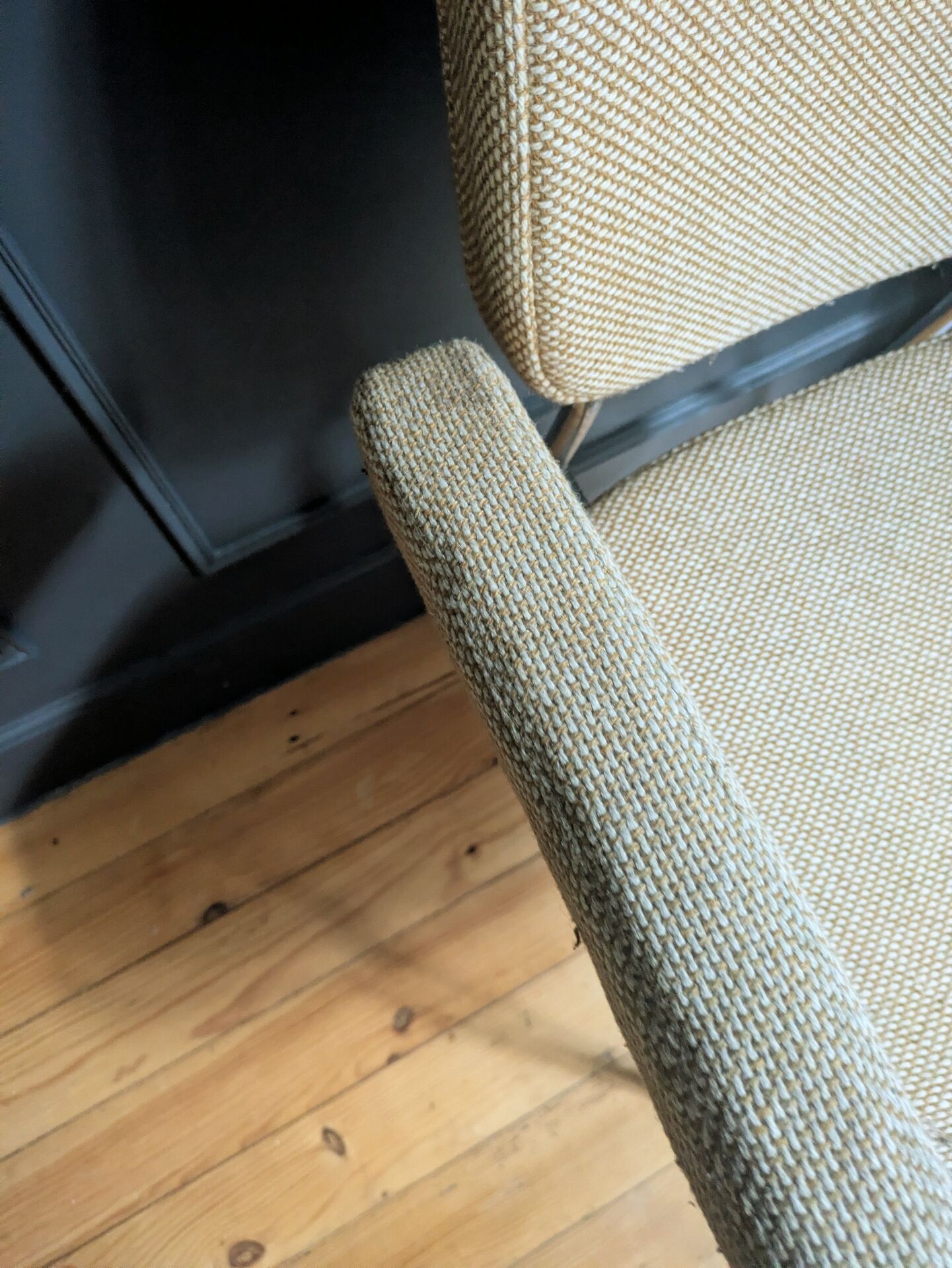 vintage tubular metal chrome office chair with patterned fabric.